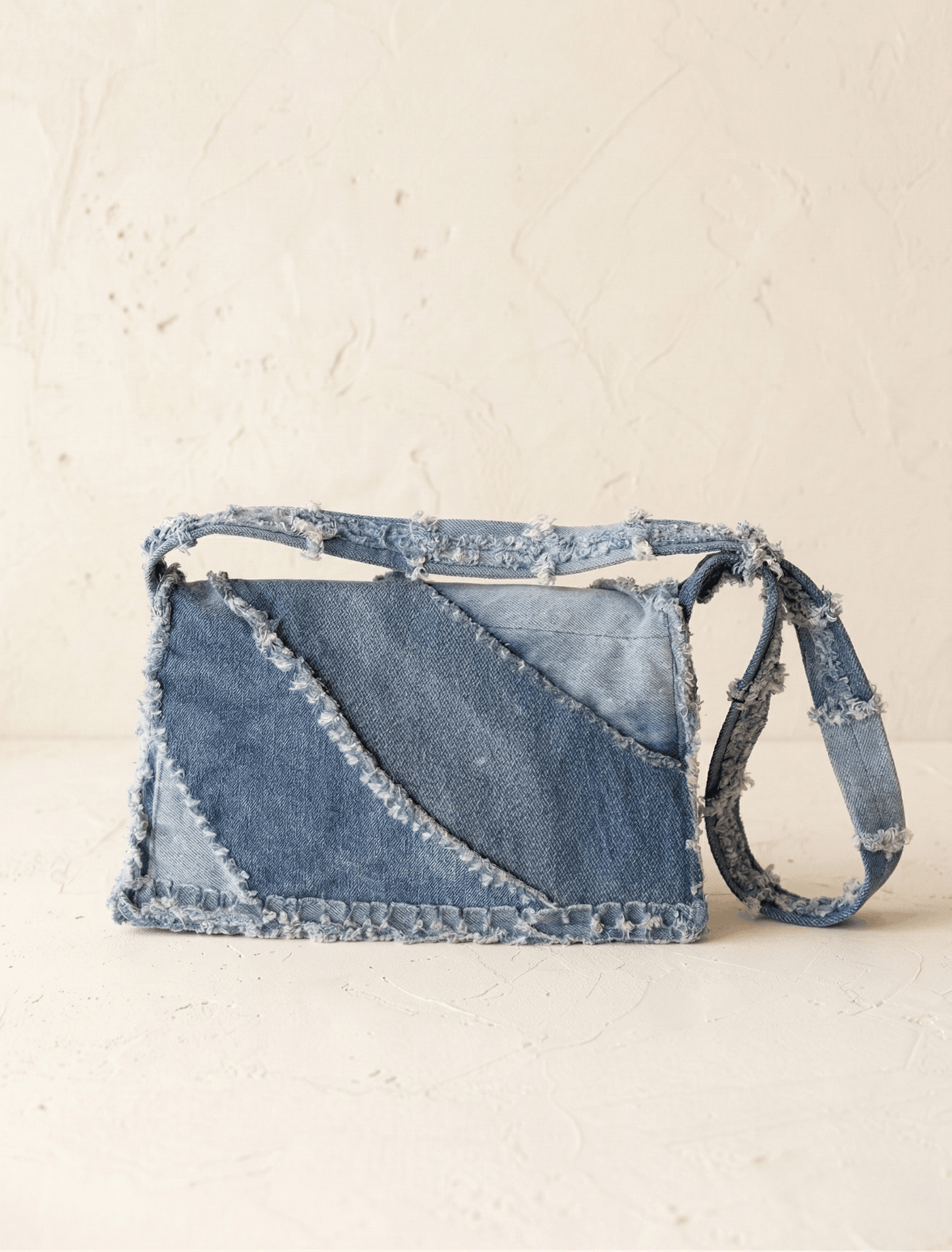 The Raw Edge Star Denim Clutch